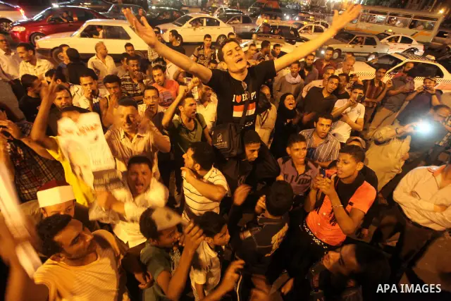 Egyptian protesters shout slogans during a protest against candidate Ahmed Shafiq and support candidate Hamdeen Sabahi, at Tahrir Square in Cairo May 27, 2012. The prospect of Shafiq succeeding Hosni Mubarak as president...