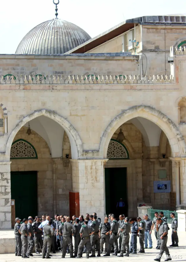 Israeli border police storm the courtyards of Al-Aqsa Mosque, in Jerusalem's old city on May 28, 2012. Photo by Mahfouz Abu Turk