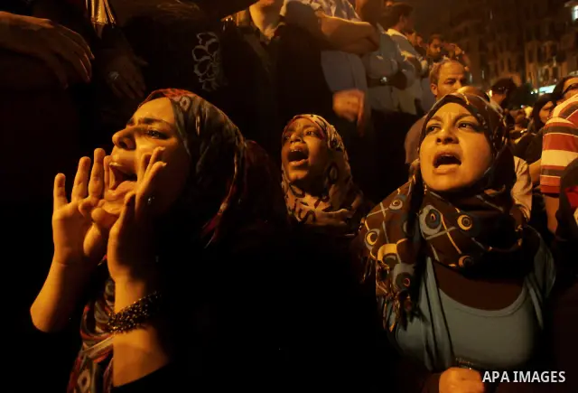 A youth takes part in a demonstration in Tahrir Square to protest the outcome of the Egyptian presidential election, Cairo, Egypt, Monday May 28, 2012. The runoff vote for Egypt's next president will pit the Muslim Broth...