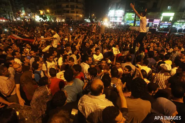A youth takes part in a demonstration in Tahrir Square to protest the outcome of the Egyptian presidential election, Cairo, Egypt, Monday May 28, 2012. The runoff vote for Egypt's next president will pit the Muslim Broth...
