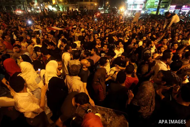 A youth takes part in a demonstration in Tahrir Square to protest the outcome of the Egyptian presidential election, Cairo, Egypt, Monday May 28, 2012. The runoff vote for Egypt's next president will pit the Muslim Broth...