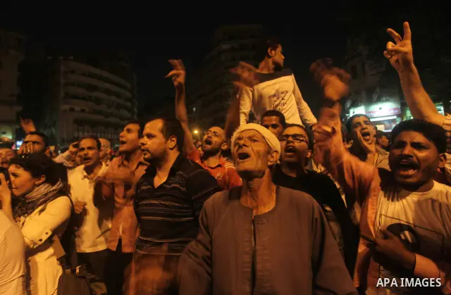 A youth takes part in a demonstration in Tahrir Square to protest the outcome of the Egyptian presidential election, Cairo, Egypt, Monday May 28, 2012. The runoff vote for Egypt's next president will pit the Muslim Broth...