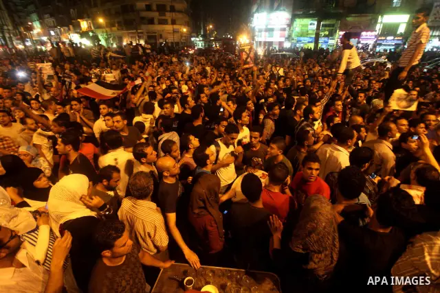 A youth takes part in a demonstration in Tahrir Square to protest the outcome of the Egyptian presidential election, Cairo, Egypt, Monday May 28, 2012. The runoff vote for Egypt's next president will pit the Muslim Broth...