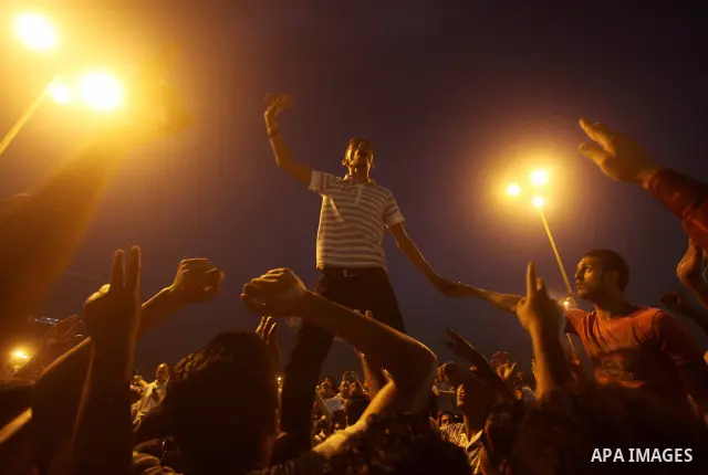 A youth takes part in a demonstration in Tahrir Square to protest the outcome of the Egyptian presidential election, Cairo, Egypt, Monday May 28, 2012. The runoff vote for Egypt's next president will pit the Muslim Broth...