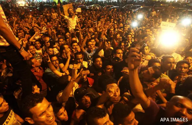 A youth takes part in a demonstration in Tahrir Square to protest the outcome of the Egyptian presidential election, Cairo, Egypt, Monday May 28, 2012. The runoff vote for Egypt's next president will pit the Muslim Broth...