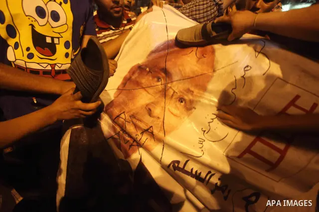 A youth takes part in a demonstration in Tahrir Square to protest the outcome of the Egyptian presidential election, Cairo, Egypt, Monday May 28, 2012. The runoff vote for Egypt's next president will pit the Muslim Broth...