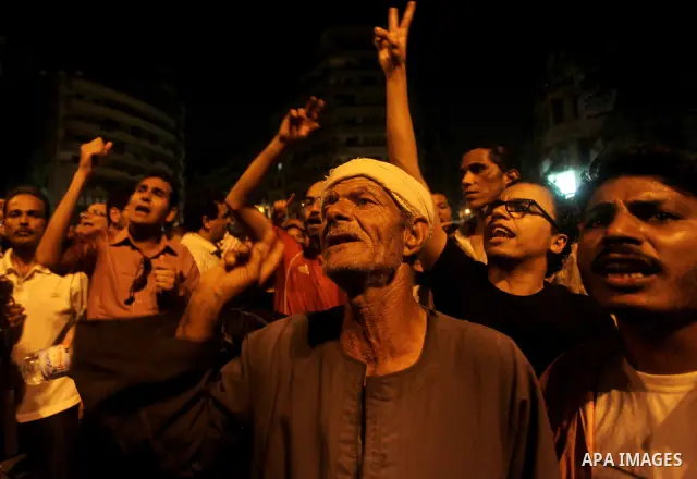 A youth takes part in a demonstration in Tahrir Square to protest the outcome of the Egyptian presidential election, Cairo, Egypt, Monday May 28, 2012. The runoff vote for Egypt's next president will pit the Muslim Broth...