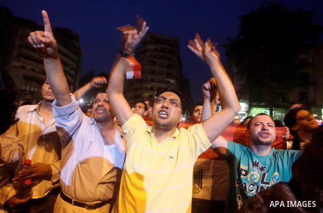 A youth takes part in a demonstration in Tahrir Square to protest the outcome of the Egyptian presidential election, Cairo, Egypt, Monday May 28, 2012. The runoff vote for Egypt's next president will pit the Muslim Broth...