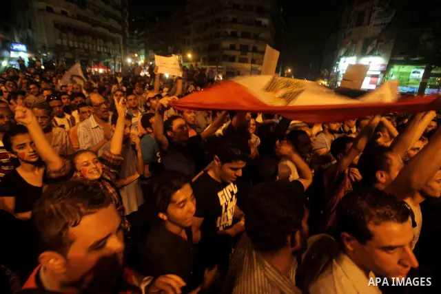 A youth takes part in a demonstration in Tahrir Square to protest the outcome of the Egyptian presidential election, Cairo, Egypt, Monday May 28, 2012. The runoff vote for Egypt's next president will pit the Muslim Broth...