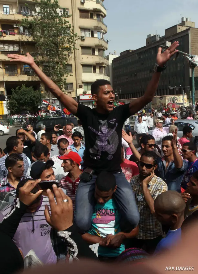 Egyptian protesters attend a demonstration, against presidential candidate Ahmed Shafiq at Tahrir Square in Cairo May 29, 2012. According to full official results released Monday by the election commission. Commission ch...
