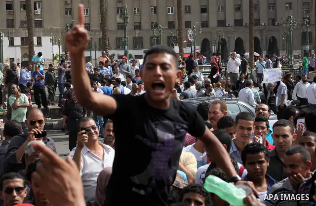 Egyptian protesters attend a demonstration, against presidential candidate Ahmed Shafiq at Tahrir Square in Cairo May 29, 2012. According to full official results released Monday by the election commission. Commission ch...