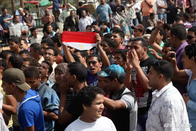 Egyptian protesters attend a demonstration, against presidential candidate Ahmed Shafiq at Tahrir Square in Cairo May 29, 2012. According to full official results released Monday by the election commission. Commission ch...