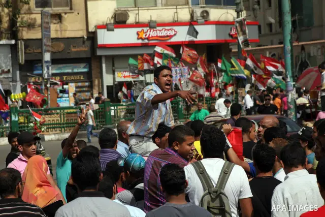 Egyptian protesters attend a demonstration, against presidential candidate Ahmed Shafiq at Tahrir Square in Cairo May 29, 2012. According to full official results released Monday by the election commission. Commission ch...