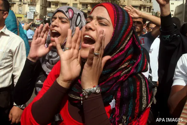 Egyptian protesters attend a demonstration, against presidential candidate Ahmed Shafiq at Tahrir Square in Cairo May 29, 2012. According to full official results released Monday by the election commission. Commission ch...