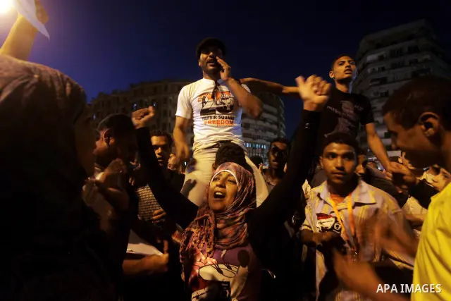 Egyptian protesters attend a demonstration, against presidential candidates Mohammed Morsi and Ahmed Shafiq at Tahrir Square in Cairo May 29, 2012. According to full official results released Monday by the election commi...