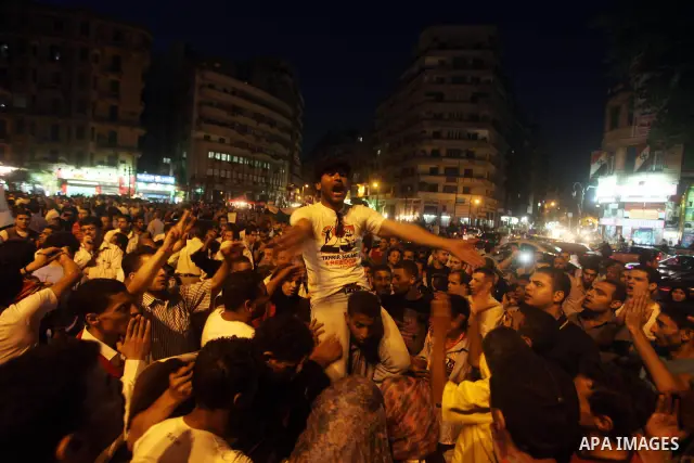 Egyptian protesters attend a demonstration, against presidential candidates Mohammed Morsi and Ahmed Shafiq at Tahrir Square in Cairo May 29, 2012. According to full official results released Monday by the election commi...