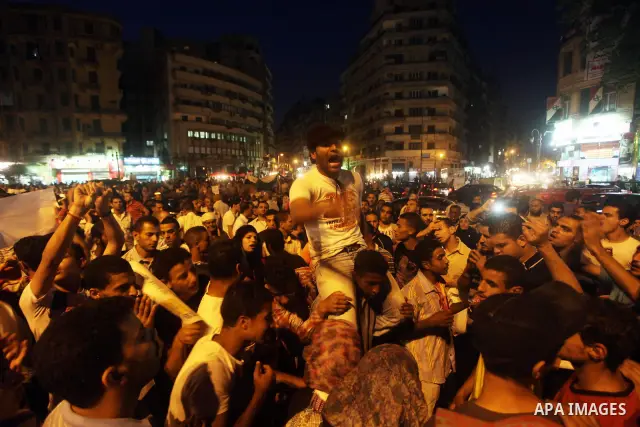 Egyptian protesters attend a demonstration, against presidential candidates Mohammed Morsi and Ahmed Shafiq at Tahrir Square in Cairo May 29, 2012. According to full official results released Monday by the election commi...