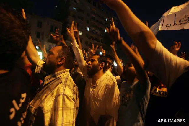 Egyptian protesters attend a demonstration, against presidential candidates Mohammed Morsi and Ahmed Shafiq at Tahrir Square in Cairo May 29, 2012. According to full official results released Monday by the election commi...