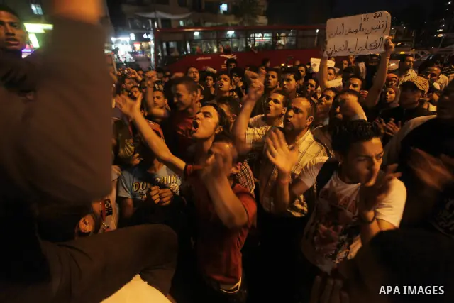 Egyptian protesters attend a demonstration, against presidential candidates Mohammed Morsi and Ahmed Shafiq at Tahrir Square in Cairo May 29, 2012. According to full official results released Monday by the election commi...