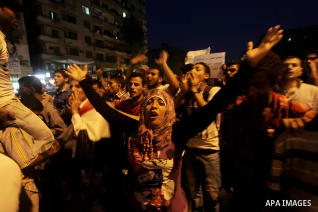 Egyptian protesters attend a demonstration, against presidential candidates Mohammed Morsi and Ahmed Shafiq at Tahrir Square in Cairo May 29, 2012. According to full official results released Monday by the election commi...