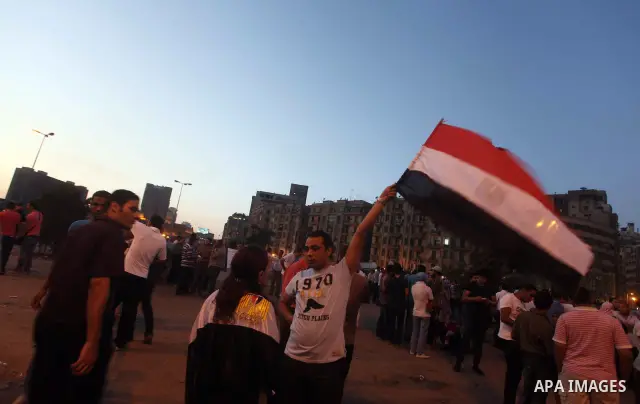 Egyptian protesters attend a demonstration, against presidential candidates Mohammed Morsi and Ahmed Shafiq at Tahrir Square in Cairo May 29, 2012. According to full official results released Monday by the election commi...