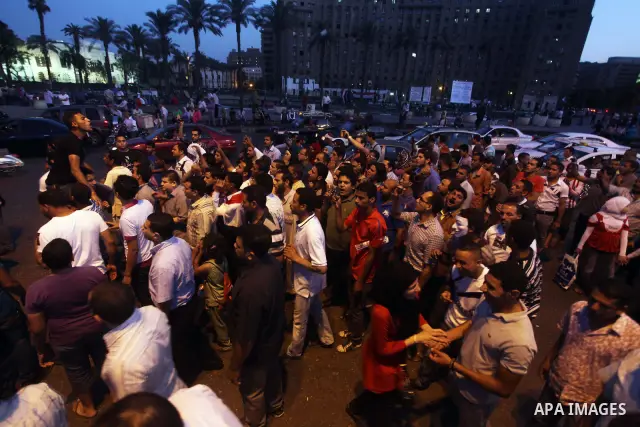 Egyptian protesters attend a demonstration, against presidential candidates Mohammed Morsi and Ahmed Shafiq at Tahrir Square in Cairo May 29, 2012. According to full official results released Monday by the election commi...