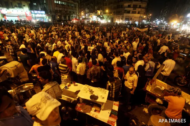 Egyptian protesters attend a demonstration, against presidential candidates Mohammed Morsi and Ahmed Shafiq at Tahrir Square in Cairo May 29, 2012. According to full official results released Monday by the election commi...