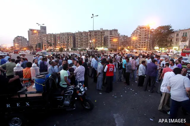 Egyptians gathers during a protest against the results of presidential elections at Tahrir Square, the focal point of the Egyptian uprising, in Cairo, Egypt, May 30, 2012. An arson attack on the headquarters of one of th...