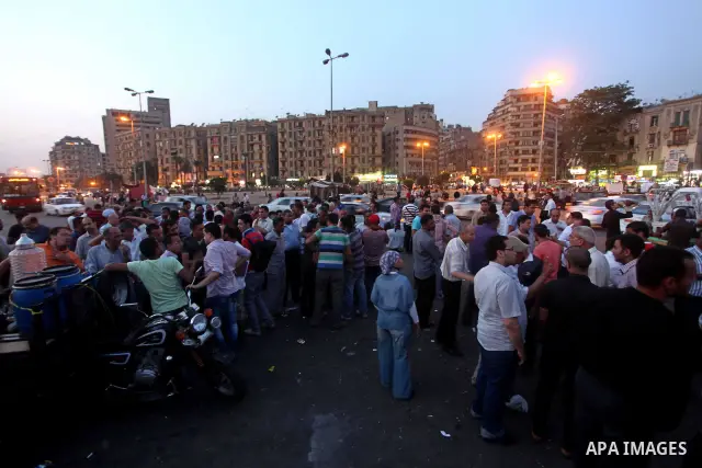 Egyptians gathers during a protest against the results of presidential elections at Tahrir Square, the focal point of the Egyptian uprising, in Cairo, Egypt, May 30, 2012. An arson attack on the headquarters of one of th...