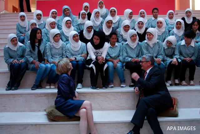 German President Joachim Gauck and Daniela Schadt, German journalist and partner of German President meet schoolgirls during the inauguration of a new girls school in the West Bank village of Burin, Thursday, May 31, 201...