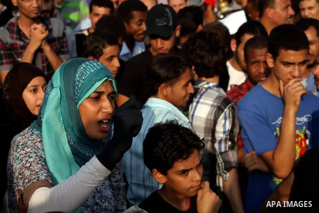 Egyptian protesters chant slogans against Egyptian presidential candidate Ahmed Shafiq in Tahrir Square decrying the result of the first round of voting in the Egyptian presidential election in Cairo, Egypt, Friday, June...
