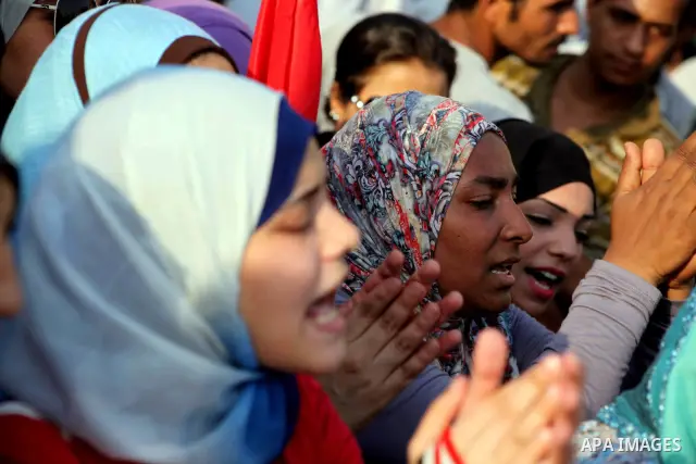 Egyptian protesters chant slogans against Egyptian presidential candidate Ahmed Shafiq in Tahrir Square decrying the result of the first round of voting in the Egyptian presidential election in Cairo, Egypt, Friday, June...