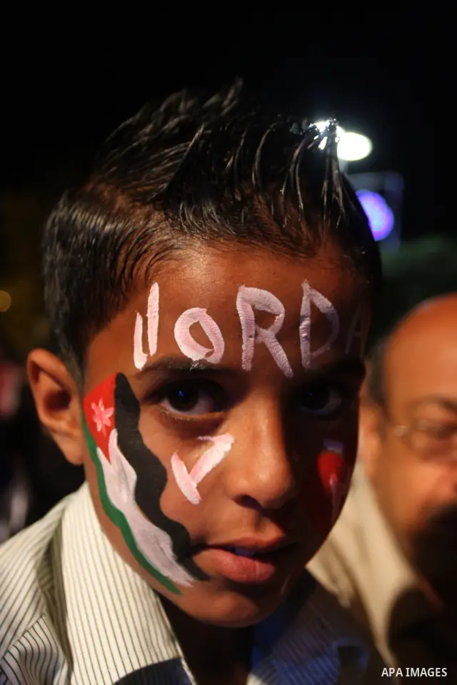 Jordanians take part ceremony "Independence Day" of the Hashemite Kingdom of Jordan in the gardens of Al-Hussein in Amman, on June 01, 2012. Photo by Issam Rimawi