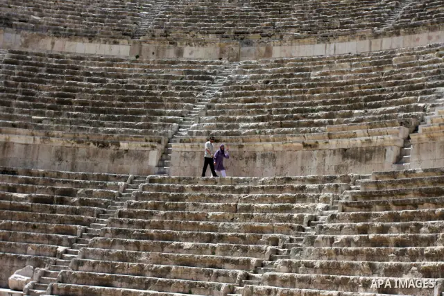 Foreign tourists in the Roman amphitheatre in Amman, Jordan, June 2, 2012. Amphitheatre of the most important Roman monuments in Amman, was built 161 years AD. Photo by Issam Rimawi