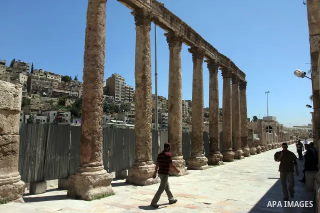 Foreign tourists in the Roman amphitheatre in Amman, Jordan, June 2, 2012. Amphitheatre of the most important Roman monuments in Amman, was built 161 years AD. Photo by Issam Rimawi