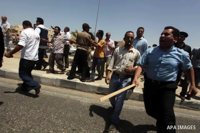 Anti-Mubarak protesters clash with riot police after a court sentenced deposed president Hosni Mubarak to life in prison, outside the police academy where the court is located in Cairo June 2, 2012. Mubarak was sentenced...