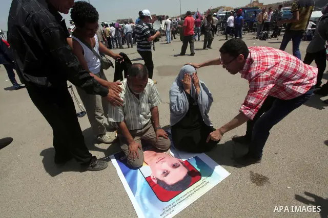 Relatives of people who died during Egypt's revolution react after a court sentenced deposed president Hosni Mubarak to life in prison, outside the police academy where the court is located in Cairo June 2, 2012. Mubarak...