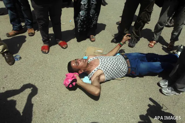 Relatives of people who died during Egypt's revolution react after a court sentenced deposed president Hosni Mubarak to life in prison, outside the police academy where the court is located in Cairo June 2, 2012. Mubarak...