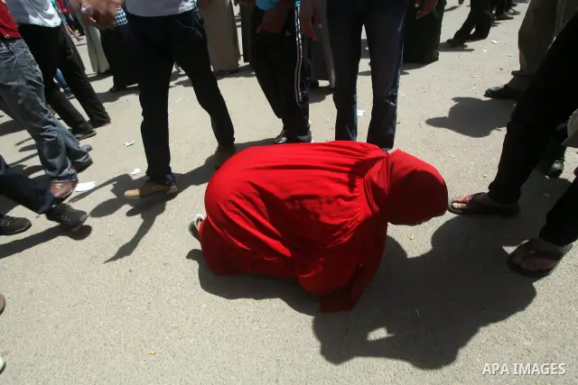 Relatives of people who died during Egypt's revolution react after a court sentenced deposed president Hosni Mubarak to life in prison, outside the police academy where the court is located in Cairo June 2, 2012. Mubarak...