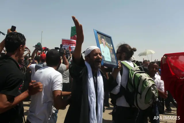 Relatives of people who died during Egypt's revolution react after a court sentenced deposed president Hosni Mubarak to life in prison, outside the police academy where the court is located in Cairo June 2, 2012. Mubarak...