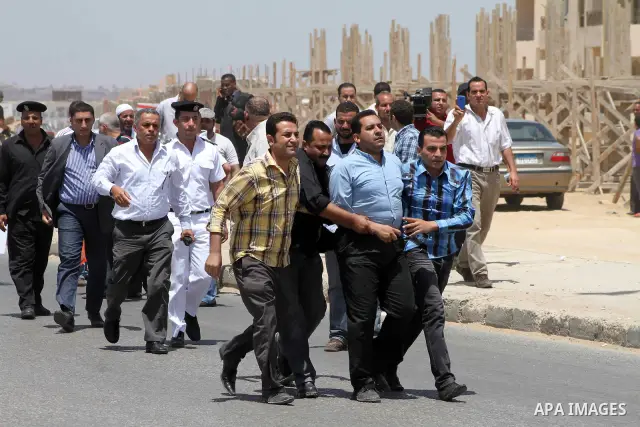 Anti-Mubarak protesters clash with riot police after a court sentenced deposed president Hosni Mubarak to life in prison, outside the police academy where the court is located in Cairo June 2, 2012. Mubarak was sentenced...