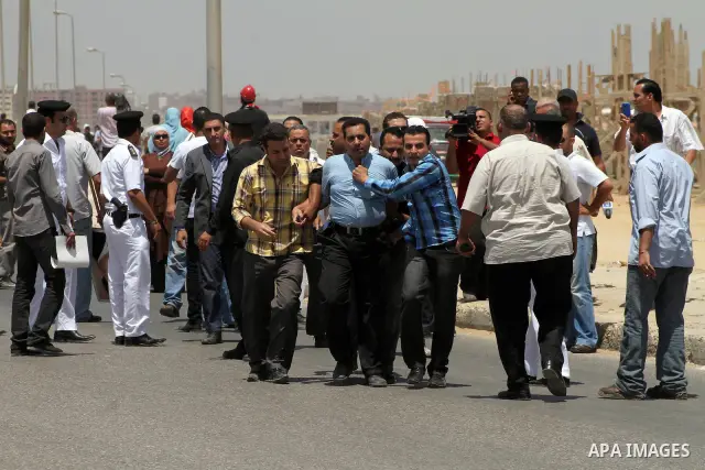 Anti-Mubarak protesters clash with riot police after a court sentenced deposed president Hosni Mubarak to life in prison, outside the police academy where the court is located in Cairo June 2, 2012. Mubarak was sentenced...