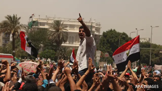 Egyptian protesters gather in Cairo's landmark Tahrir Square on June 3, 2012. Hundreds of demonstrators are occupying Tahrir Square after a court sentenced ousted president Hosni Mubarak and his interior minister Habib a...