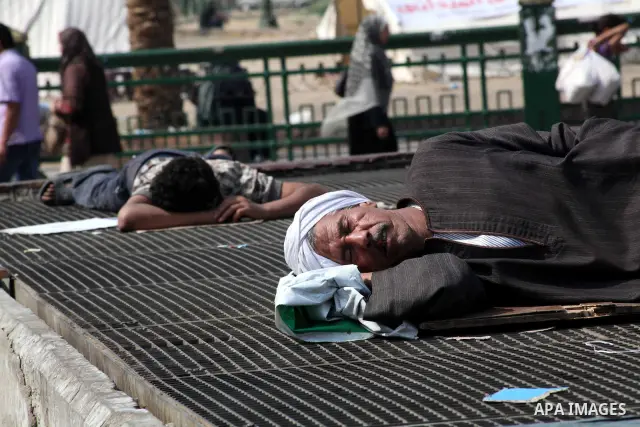 Egyptians sleep during a sit-in at Tahrir Square, after a court sentenced deposed president Hosni Mubarak to life in prison, in Cairo June 4, 2012. Thousands of Egyptians have taken to the streets in protest at the verdi...