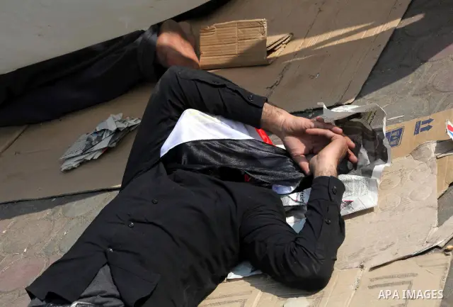 Egyptians sleep during a sit-in at Tahrir Square, after a court sentenced deposed president Hosni Mubarak to life in prison, in Cairo June 4, 2012. Thousands of Egyptians have taken to the streets in protest at the verdi...