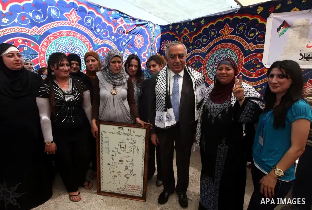 Palestinian Prime Minister, Salam Fayyad, visits the village of Nabi Samuel in the west of Jerusalem, on June 04, 2012. Photo by Mustafa Abu Dayeh