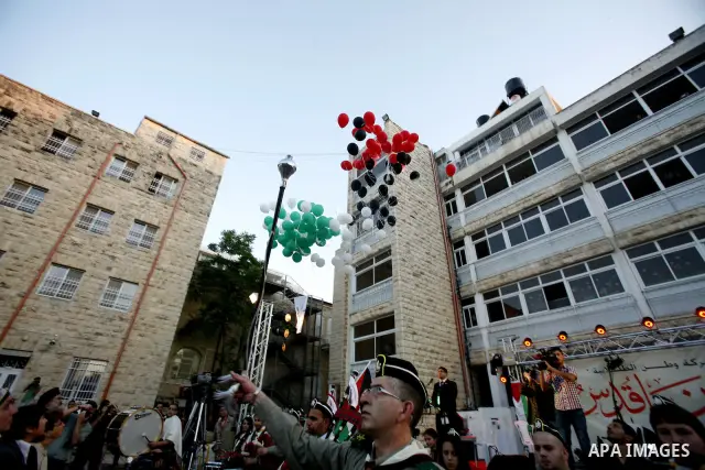 Palestinians watch a ceremony and performance commemorating the 1967 setback in Jerusalem on June 04,2012. Students movement homeland of the Hebrew University salutes the anniversary of the setback in 1967. The setback i...
