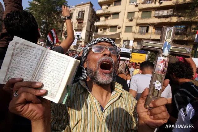 Egyptian protesters shout slogans against former President Hosni Mubarak and his aides during the protests after the announcement of the verdict in their trial, at Tahrir square, Cairo, Egypt, 05 June 2012. Opposition gr...