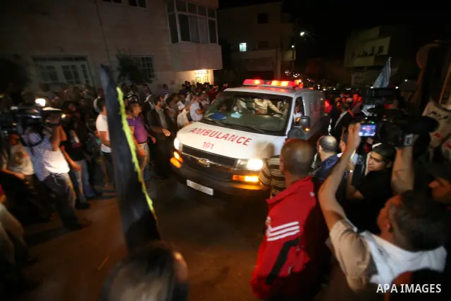 Palestinians celebrate after the Israeli authorities released prisoner Thaer Halahleh in the West Bank Village of Kharas near Hebron on June 05, 2012. Thaer Halahla, 33, from Hebron was in administrative detention for th...