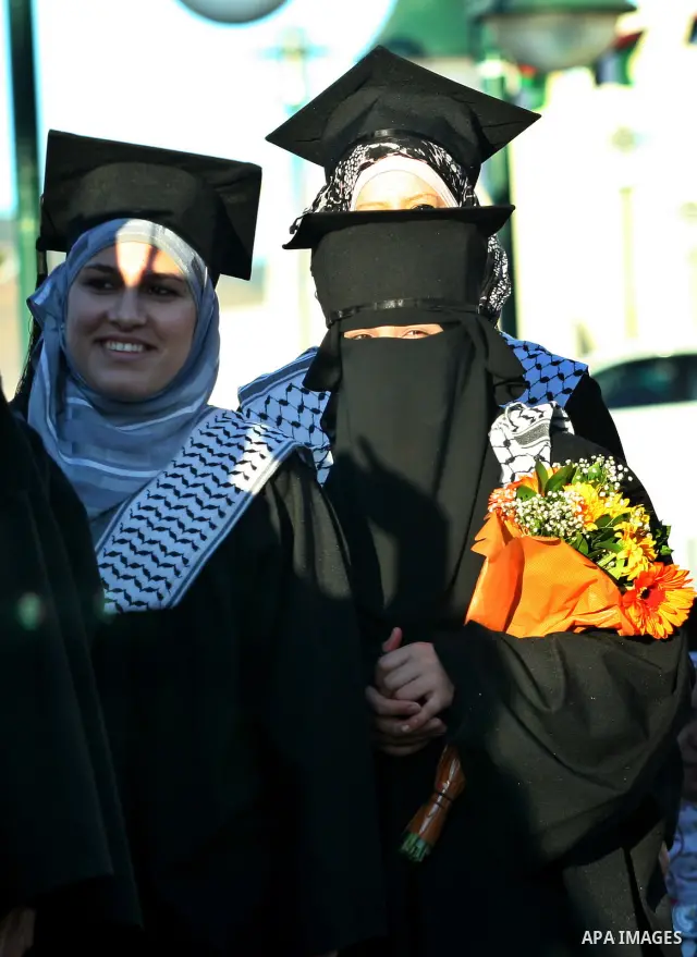 Palestinian students celebrate during the 32nd Graduation Ceremony at Al - Najah University in The West Bank City of Nablus on 07 June 2012. Al - Najah University is a Palestinian non-governmental public university gover...